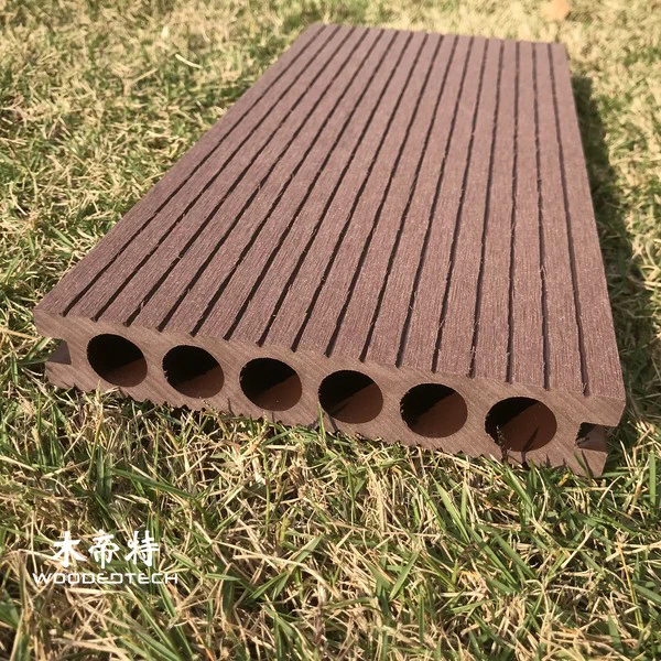 D14025-6 wpc composite decking with walnut color and round hollow groove surface creates a practical outdoor flooring solution